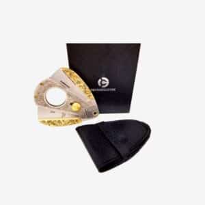 Πουροκόπτης Γκιλοτίνα 54 Ring Με Χρυσές Λεπτομέρειες μεταλλικός μαζί με τη μαύρη δερμάτινη θήκη του και τη μαύρη συσκευασία του