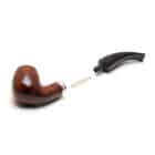 πίπα καφέ γυαλιστερή ανοιγμένη για να επιδείξει την αλλαγή φίλτρου